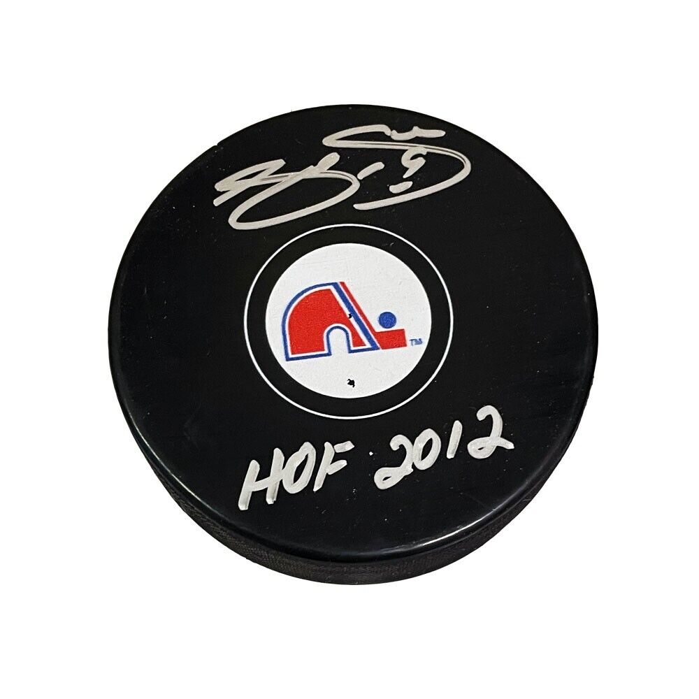 JOE SAKIC Signed Quebec Nordiques Puck With HOF 2012
