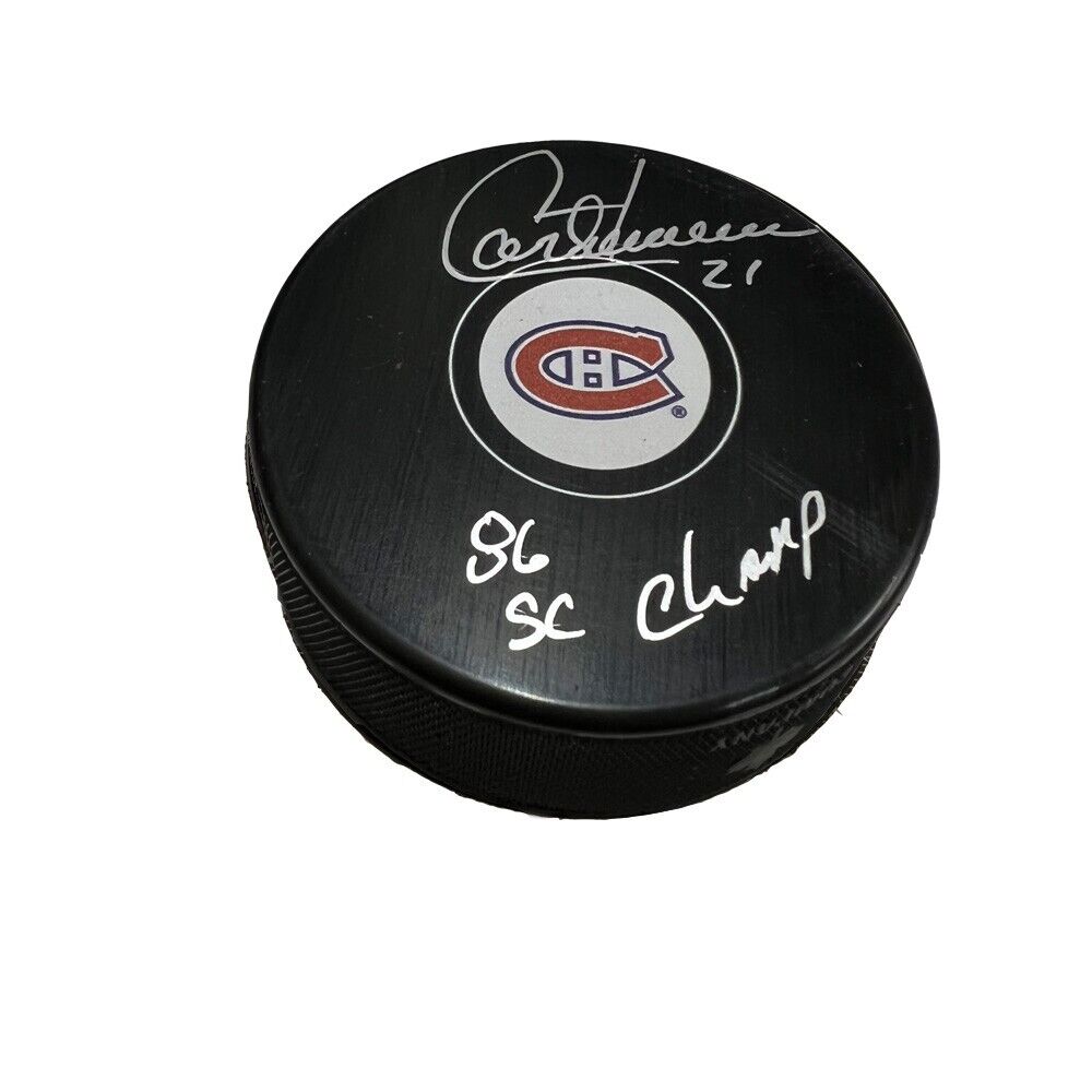 GUY CARBONNEAU Signed Montreal Canadiens Puck - 86 SC Champ Inscription