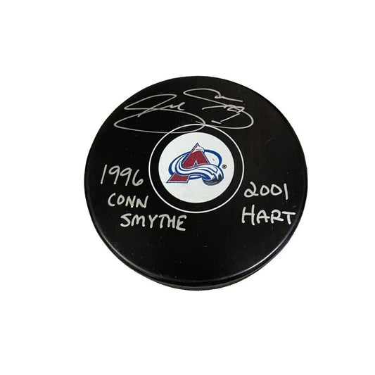 JOE SAKIC Signed Colorado Avalanche Puck- 1996 CONN SMYTHE & 01 HART Inscription