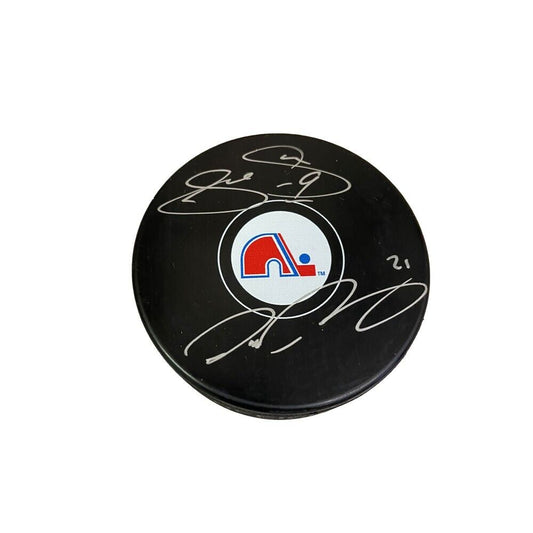 JOE SAKIC & PETER FORSBERG Dual Signed Quebec Nordiques Puck