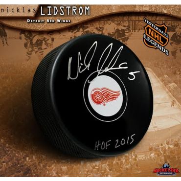 Nicklas Lidstrom Autographed Autographed Detroit Red Wings Puck with HOF Inscription