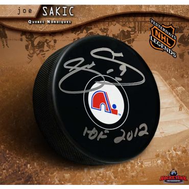 Joe Sakic Autographed Quebec Nordiques Puck with HOF 2012 Inscription